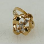 18ct ct yellow gold designer 4 stone diamond cluster, each stone around 7 - 8 pts. Size N1/2.