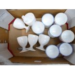 A collection of Shelley egg cups to include, Dainty shape, Plain white, Wildflowers design,