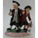 Parson and Clerk Staffordshire figure group.