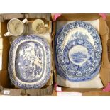 A mixed collection of ceramic items including large blue and white early platters,