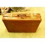 A large brown pioneer luggage bag /suitcase