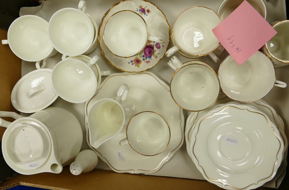 A Wedgwood metalised coffee set,together with Royal Victoria Summer Rose cups aand saucers etc..