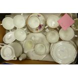 A Wedgwood metalised coffee set,together with Royal Victoria Summer Rose cups aand saucers etc..