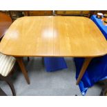 Teak mid-century McIntosh style extending fold out dining table