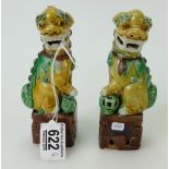 Pair of Chinese ' Dogs of Fo' figures standing 14.5cm high.