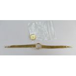 18ct hallmarked ladies gold wrist watch case & bracelet 14.4g, damaged, movement missing.