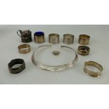 Quantity of silver napkin rings and other silver items. 383 grams weighable silver.