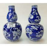 Pair blue & White oriental vases 19.5cm high.