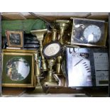 A mixed collection of metal ware items including brass candlesticks, similar anniversary clock,