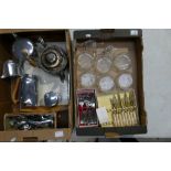 Two trays containing various glassware, fish knives & forks, silver plated tea pot & other items.