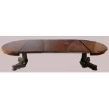 William lV mahogany D ended extending dining table on casters, with 5 extension leaves.