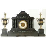 Black slate and marble garniture clock set comprising a mantle clock with two lamps with shades (3)