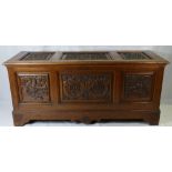 A 19th Century solid carved oak triple panelled blanket box.