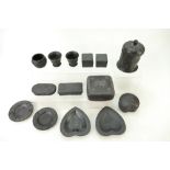 A collection of Wedgwood black basalt it