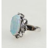 18ct white gold ring set large and colourful opal 16mm x 10.5mm. Ring size L.