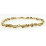 18ct gold ornate bracelet set with 30 di