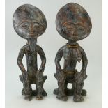 Pair of African carved wooden figures, b