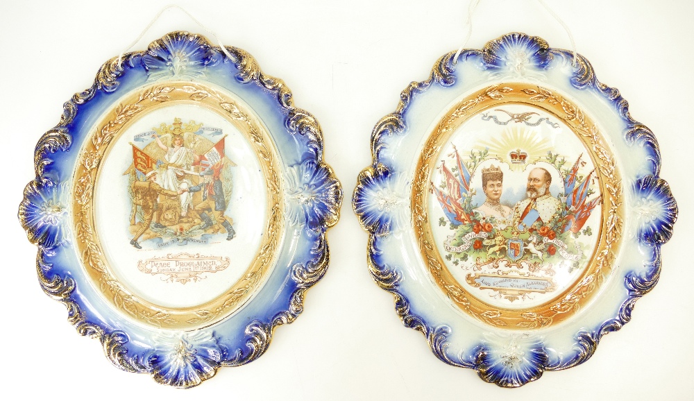 Pair of earthenware wall plaques, one Bo