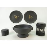 A collection of Wedgwood black basalt an