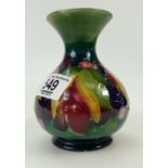 Moorcoft vase decorated in the leaf and berry design,