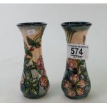 Pair of Moorcroft Moonfruit patterned vases,