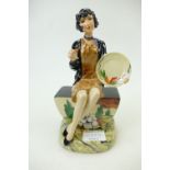 Kevin Francis figure Clarice Cliff seated with plate: Figure in a special colourway,