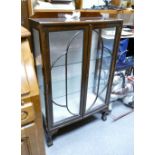 Display cabinet: Early 20th Century Mahogany ball and claw 2 door glazed display cabinet