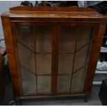 Display Cabinet: Edwardian/Early 20th Century ball and claw 2 door glazed display cabinet