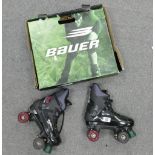 Pair of Bauer Turbo roller skates