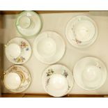 A collection of Shelley cups and saucers: Shelley tea ware in varying shapes and patterns.