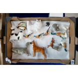 A collection of Royal Doulton & Beswick cats and dogs: including Beswick birds etc Beswick small