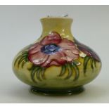 Moorcroft clematis squat vase: Clematis on yellow ground pattern. Height approx 12cm.