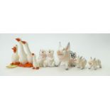 A collection of Beswick items to include: Pair Geese 820, Gosling 821, Duck Skiing, Piglet trotting,