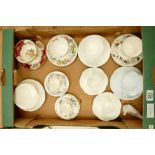 A collection of Shelley cups and saucers: Shelley tea ware in varying shapes and patterns.