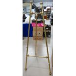 Reproduction brass easel: Reproduction brass easel.