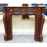 Fire Surround: Louis XV French style reproduction mahogany fire surround.