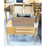 Sewing items: Mid century teak sewing cabinet, together with earlier boxed empress sewing machine.