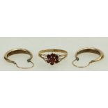 9ct ladies ring & 9ct gold earrings: Ring set with garnets, size N, 2.4 grams.