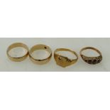 A collection of 4 gold rings: Total weight of rings 12.7g including stones (1 with missing stone).