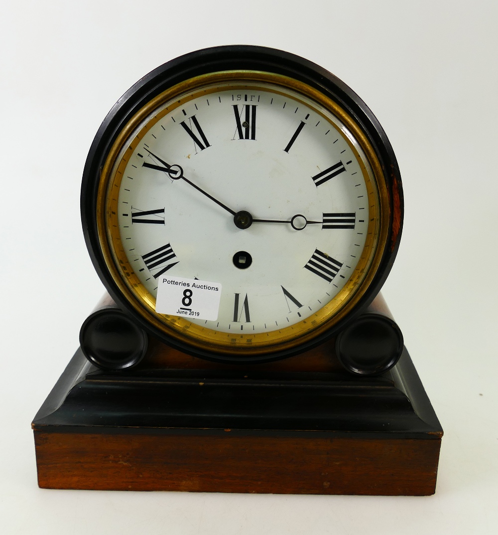 Blackened and Ebonised Drum top mantle clock: Clock with French made movement with key.