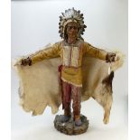 Large Resin Figure: Large North American Indian with real fur. Damage to Feathers on headband.