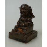 Doulton Lambeth Stoneware Bridge game counter with grotesque figure of a Booby: Bridge game counter