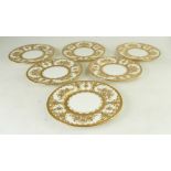 Set of 6 Minton service plates with profuse gilded decoration: Plates marked x 1030, diameter 20cm.