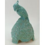 Doulton & Co speaker cover of a Parrot on Rock: Parrot in blue glazed colours,