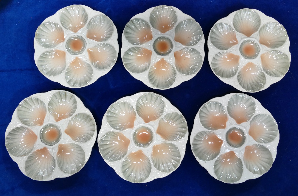 Set of six Sarreguemines Majolica oyster plates: Six plates c1930s, three coloured, diameter 24cm.