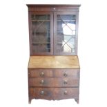 Georgian Mahogany inlaid Bureau Bookcase: Bookcase with inlaid fitted interior on splayed bracket