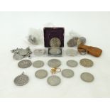 A collection of coins etc.