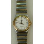 Omega Constellation steel and gold date quartz Wristwatch: Wristwatch in mid size with box and