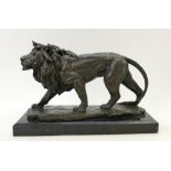 Bronze Lion on a marble base: Large bronze Lion sculpture mounted on marble base.