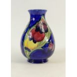Moorcroft Wisteria vase: A William Moorcroft vase decorated in the Wisteria design, height 19cm.